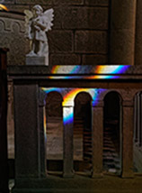 Riflessi di luce alla fonte battesimale della Chiesa dei Santi Vincenzo e Anastasio a Pieve San Vincenzo.