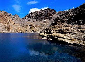 Il Lago delle Forciolline, sullo sfondo da sx: Passo delle Sagnette, Punta Piemonte e Passo delle Forciolline.