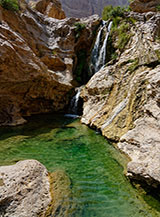 La prima splendida piscina naturale che s&rsquo;incontra alla base della Mibam Waterfall.